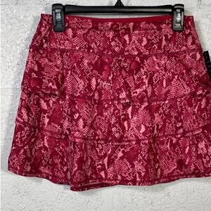 ID Ideology Women's Flounce Skort. snake, cranberry whip, XS